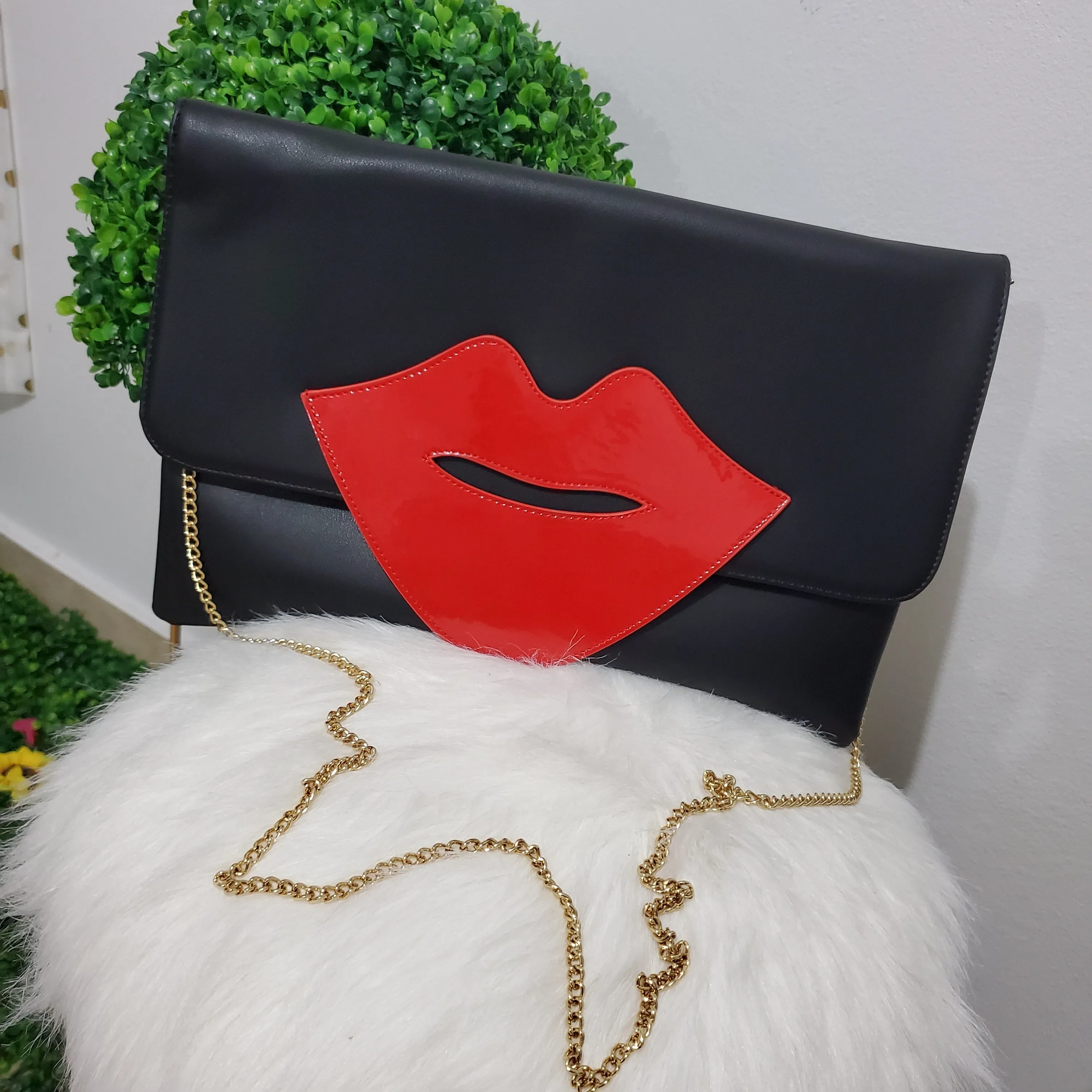 Red Lips Black Clutch