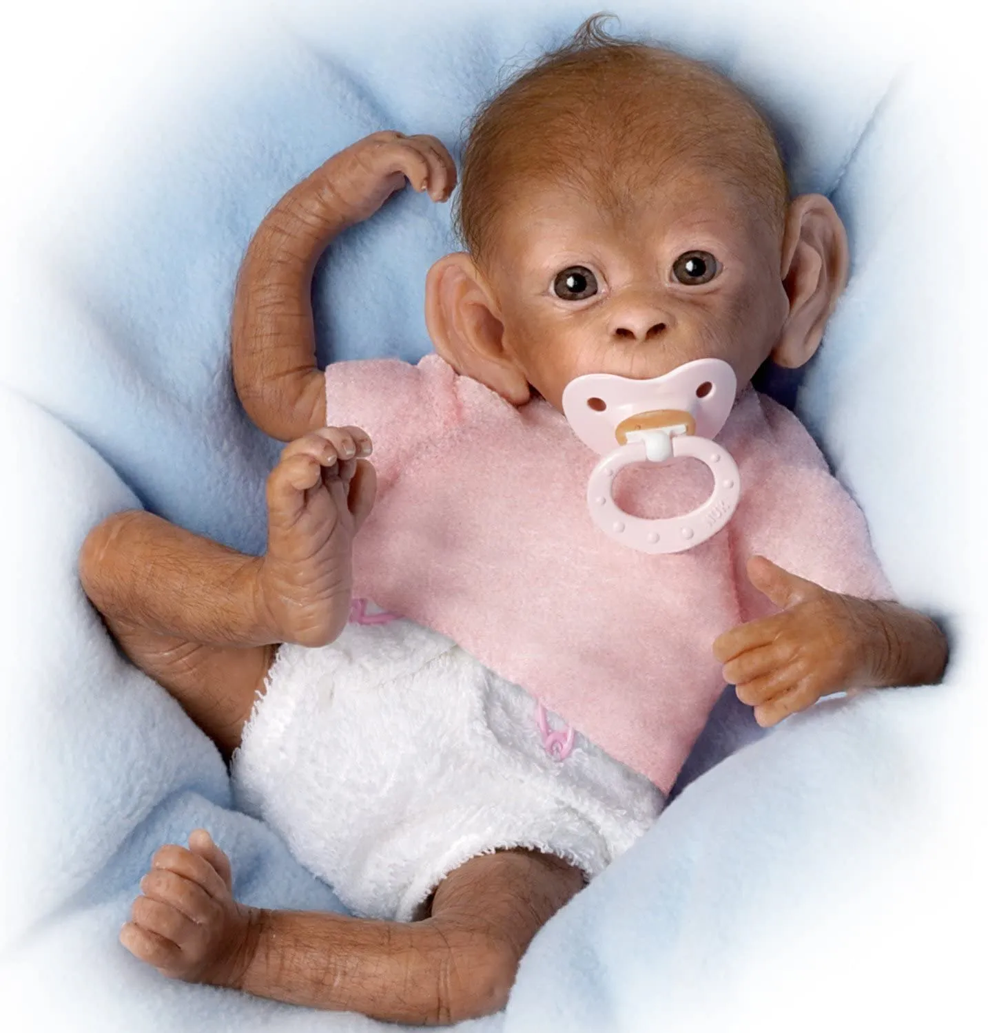 The Ashton - Drake Galleries Coco Lifelike So Truly Real® Baby Girl Monkey Doll Fully Poseable with Soft RealTouch® Vinyl Skin and Hand Applied Hair by Award-Winning Doll Artist Linda Murray 16"-Inches